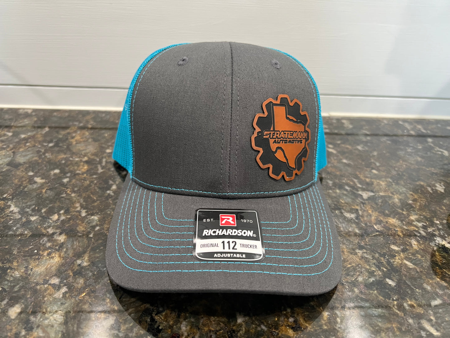 Charcoal/Neon Blue Hat with Buckskin Leather Logo