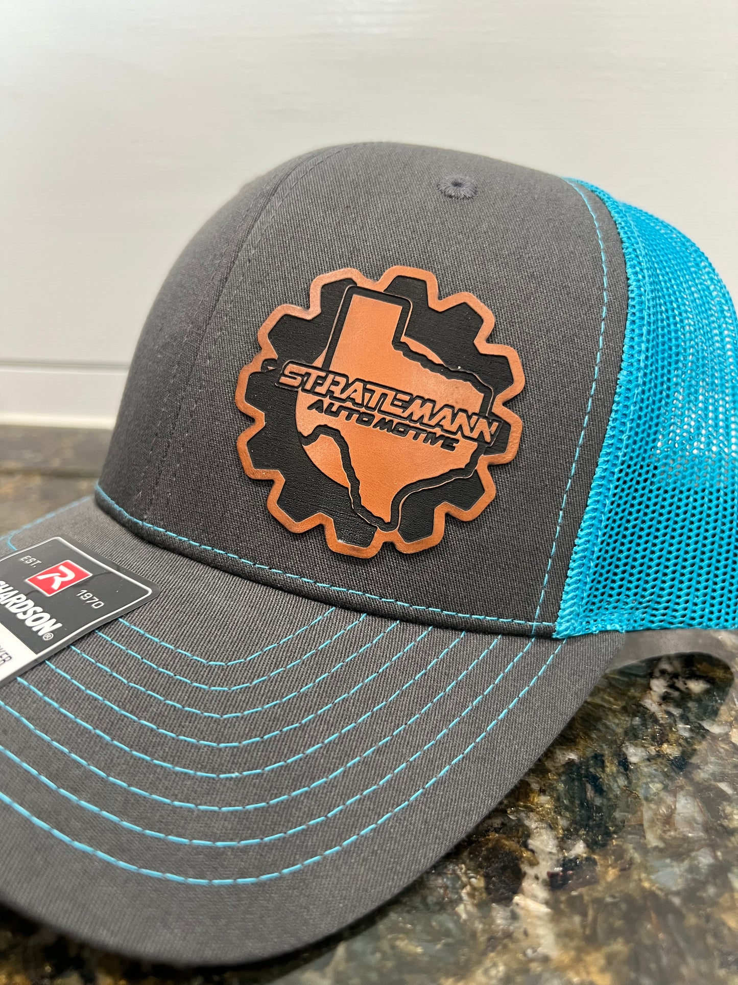 Charcoal/Neon Blue Hat with Buckskin Leather Logo