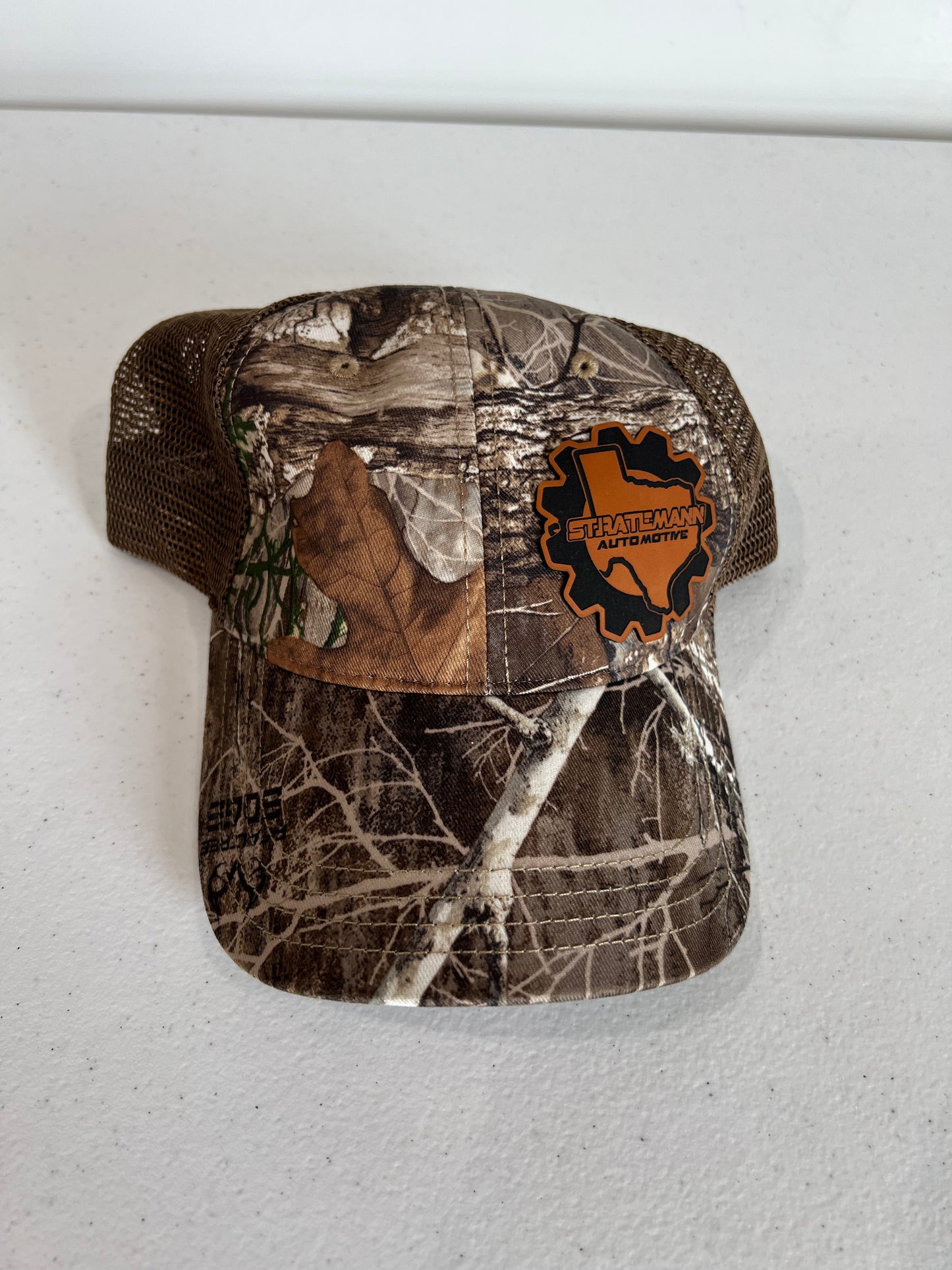 Realtree Edge/Brown Hat with Buckskin Leather Logo